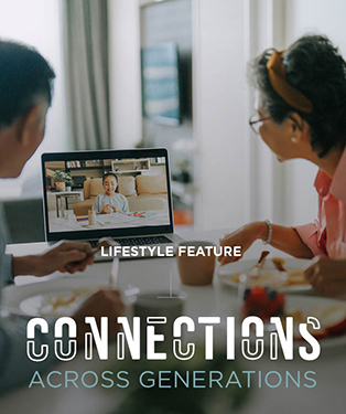 Two people sitting at a table with the text'connections across generations'.